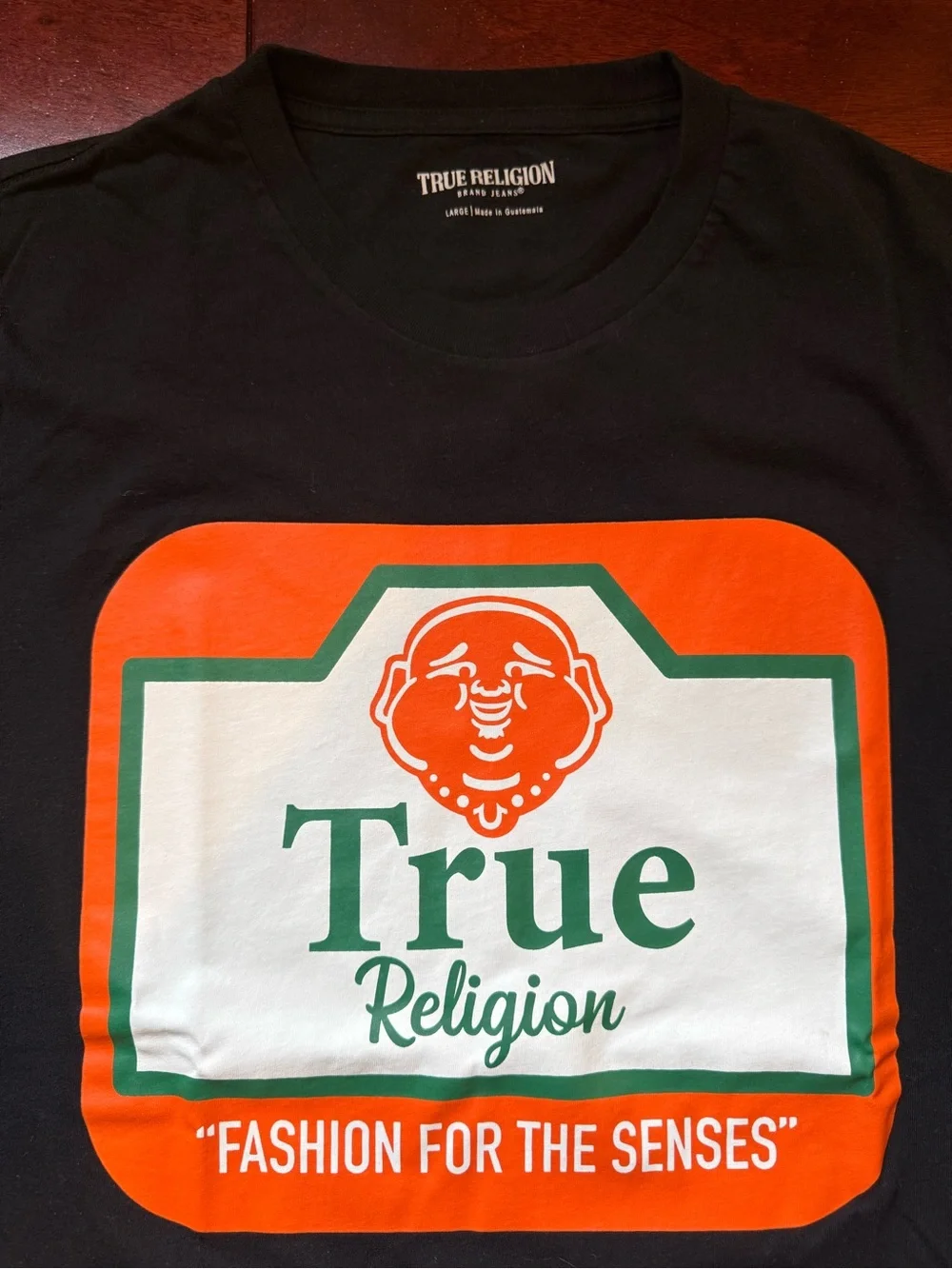 True Religion Black Tee with Orange and Green Logo Graphic
